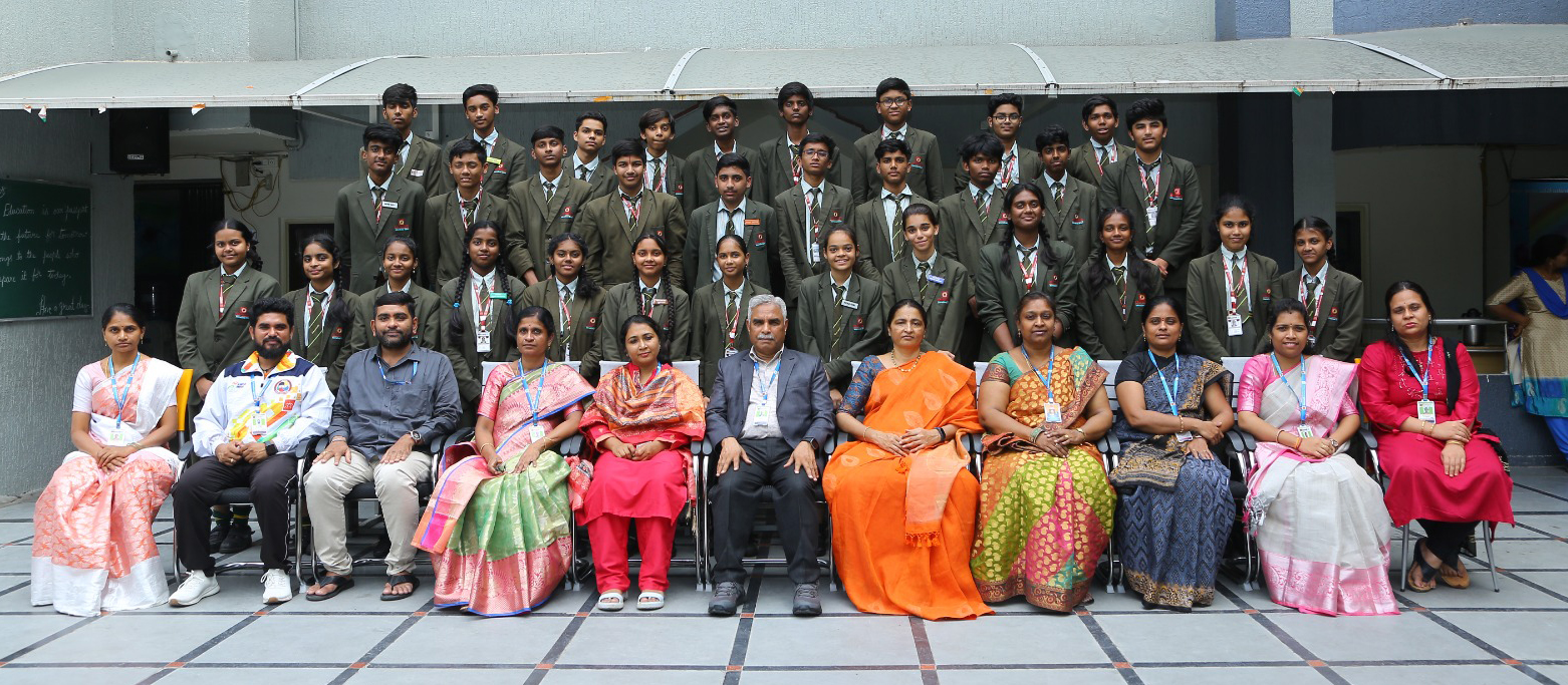 Oakwood secondary students with teachers and school leadership